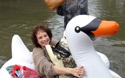 Midwife Rides Swan Floatie Through Flood to Deliver Baby